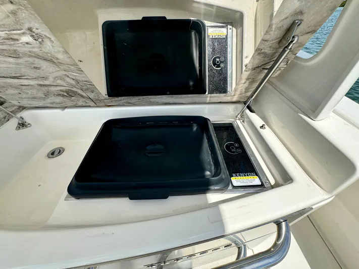 Mermaiden Yacht Photos Pics Outdoor kitchen on 2020 Solace 345 boat with stove and sink.