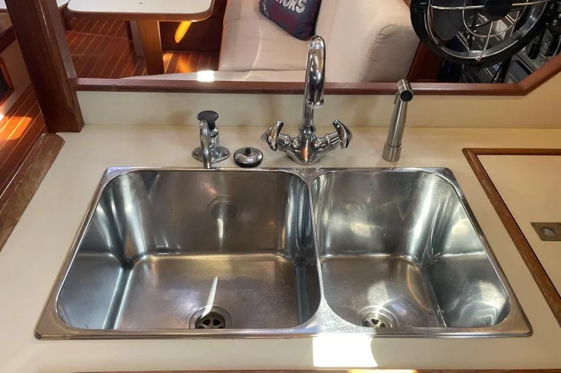 Dream Flower Yacht Photos Pics Stainless steel double sink in a 1995 Island Packet 40