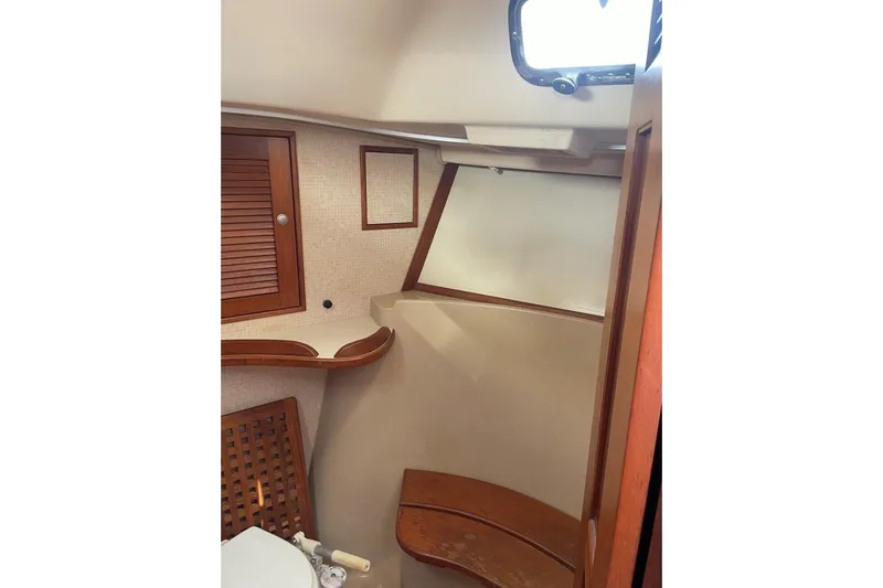 Dream Flower Yacht Photos Pics 1995 Island Packet 40 forward head shower seat