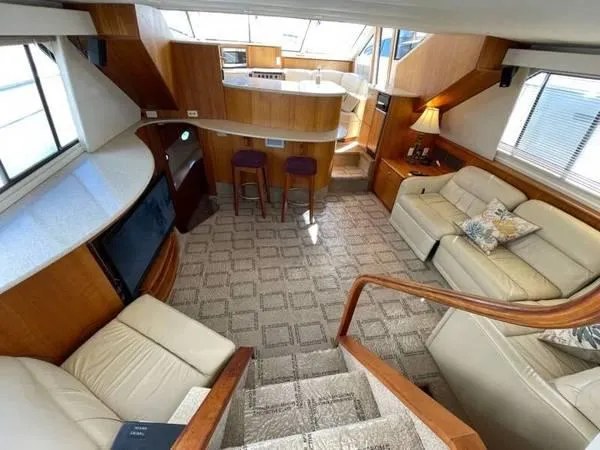  Yacht Photos Pics Luxurious interior of 2000 Silverton 453 Motor Yacht with elegant seating and modern amenities.