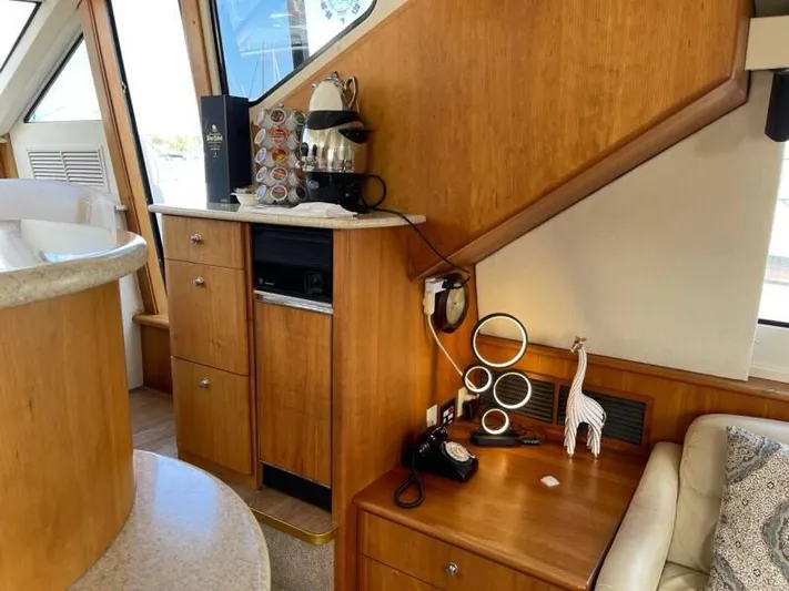  Yacht Photos Pics Interior of 2000 Silverton 453 Motor Yacht with wooden cabinetry and modern amenities.