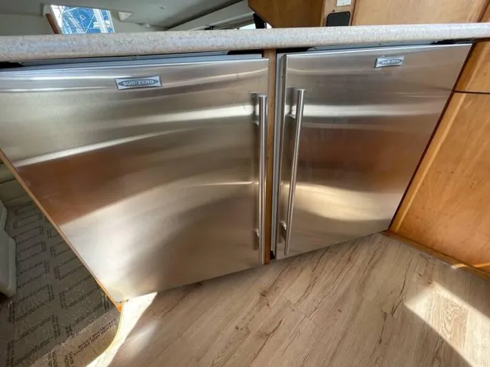  Yacht Photos Pics Stainless steel refrigerator doors inside a 2000 Silverton 453 Motor Yacht kitchen.