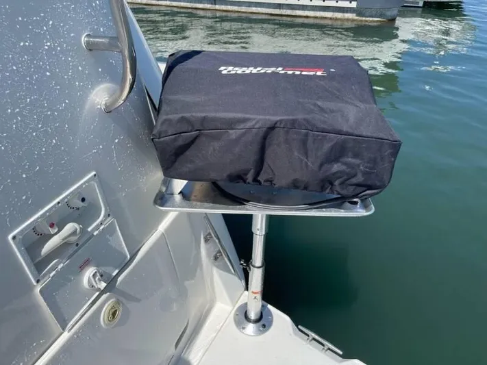  Yacht Photos Pics Outdoor grill on a 2000 Silverton 453 Motor Yacht, covered and mounted by the water.