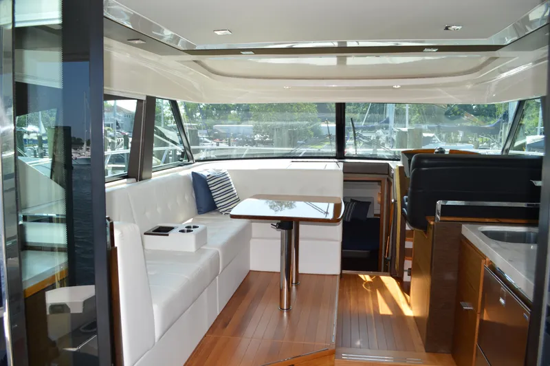Andros Yacht Photos Pics Interior of 2016 Tiara Yachts C44 Coupe with elegant seating and modern design.