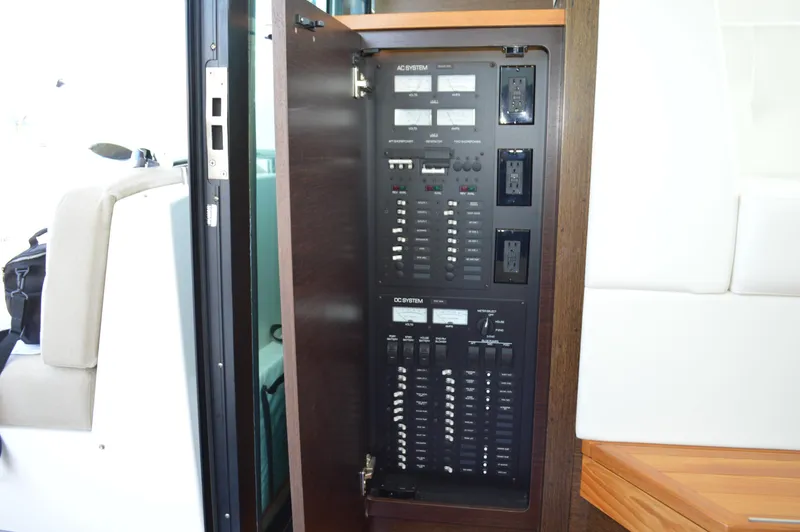 Andros Yacht Photos Pics Electrical panel inside 2016 Tiara Yachts C44 Coupe, featuring switches and outlets.