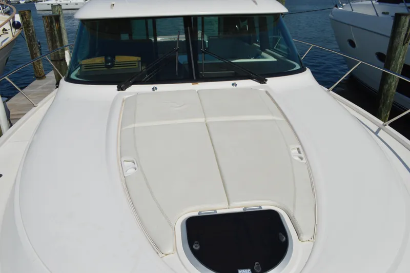 Andros Yacht Photos Pics 2016 Tiara Yachts C44 Coupe bow view at marina dock.