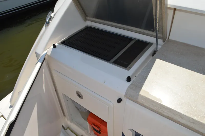 Andros Yacht Photos Pics Outdoor grill on 2016 Tiara Yachts C44 Coupe, featuring sleek design and functionality.