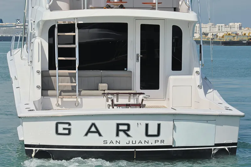  Yacht Photos Pics 2004 Hatteras 54 Convertible yacht, rear view, docked in San Juan, PR.