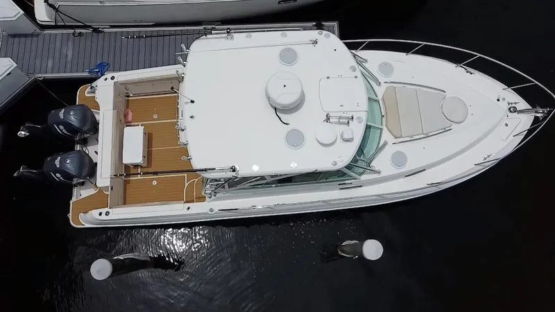  Yacht Photos Pics Aerial view of 2014 Wellcraft 340 Coastal boat docked at marina.