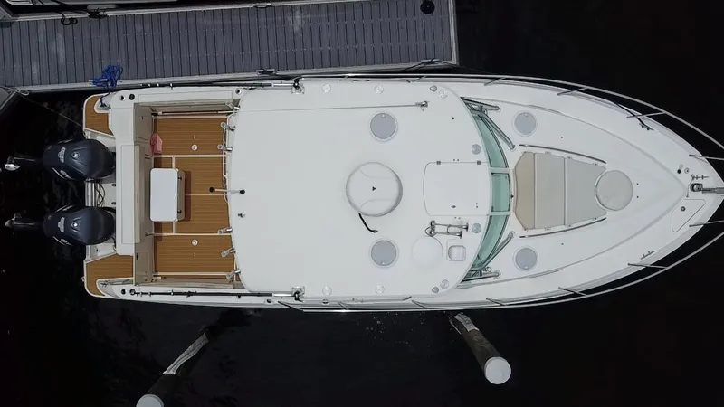  Yacht Photos Pics Overhead view of 2014 Wellcraft 340 Coastal boat docked at marina.