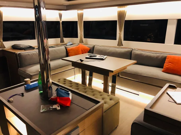  Yacht Photos Pics Luxurious interior of 2019 Lagoon 50 yacht with modern seating and ambient lighting.