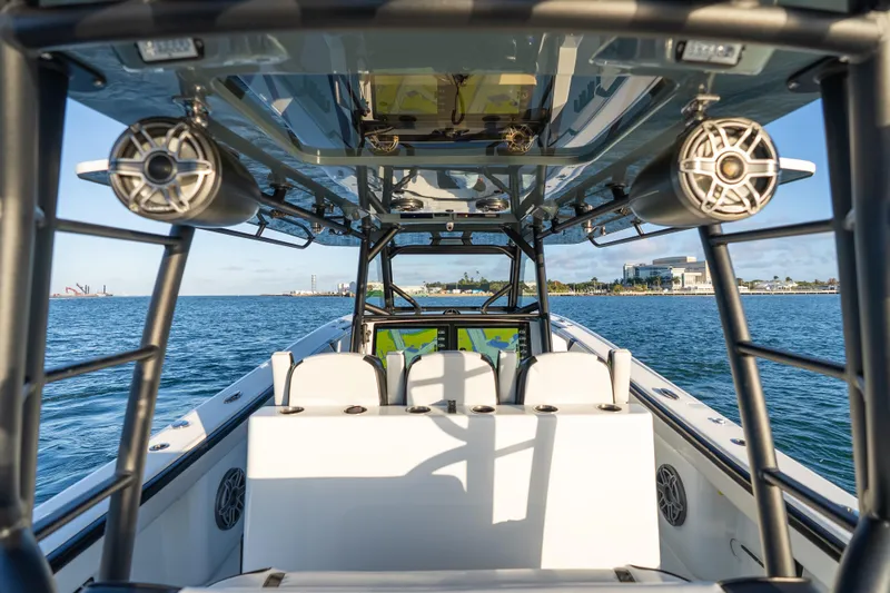  Yacht Photos Pics 2023 Yellowfin 42 Offshore boat interior with ocean view and modern equipment.