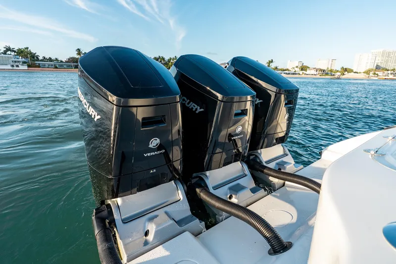  Yacht Photos Pics Triple Mercury Verado engines on 2023 Yellowfin 42 Offshore boat in coastal waters.