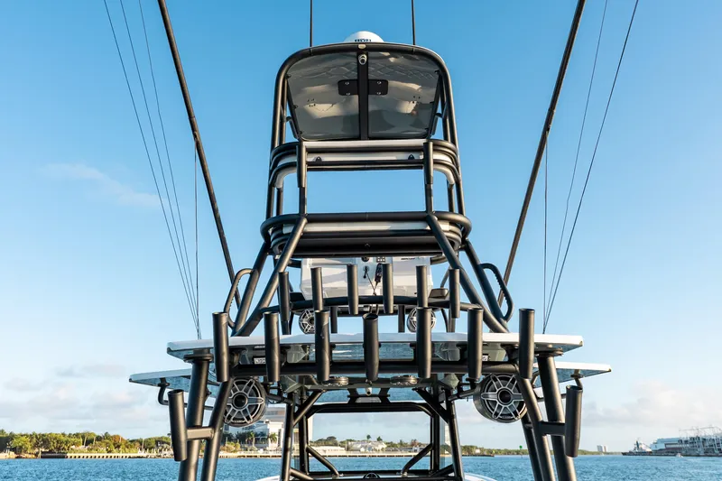 Yacht Photos Pics 2023 Yellowfin 42 Offshore boat tower against clear blue sky.