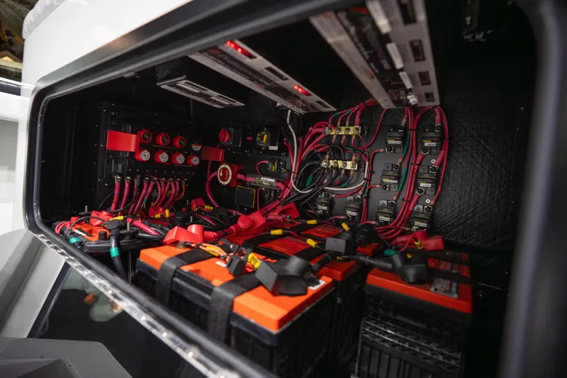  Yacht Photos Pics Electrical system of 2023 Yellowfin 42 Offshore boat, showcasing batteries and wiring.