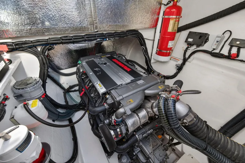  Yacht Photos Pics Engine room of 2024 Leopard 46 Powercat with modern equipment and fire extinguisher.