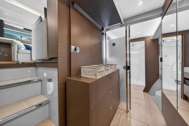  Yacht Photos Pics Luxurious interior of 2024 Leopard 46 Powercat yacht, featuring modern wood finishes and elegant design.