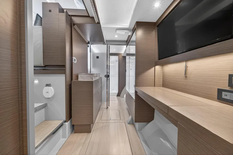  Yacht Photos Pics Luxurious interior of 2024 Leopard 46 Powercat yacht with modern wood finishes and sleek design.