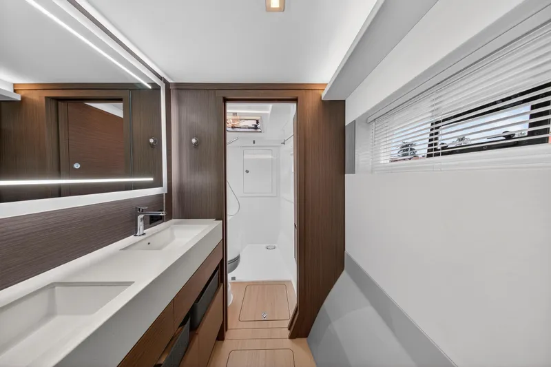  Yacht Photos Pics Luxurious bathroom interior of 2024 Leopard 46 Powercat yacht with modern fixtures.