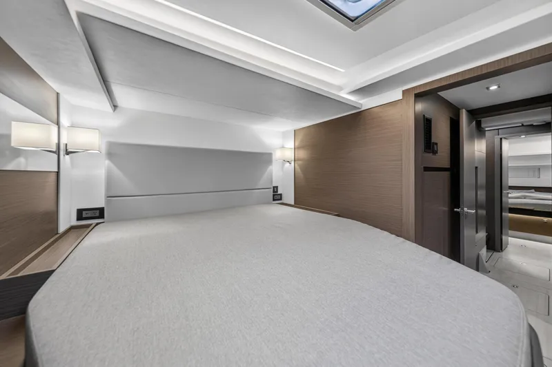  Yacht Photos Pics Luxurious interior of 2024 Leopard 46 Powercat yacht bedroom with modern design.