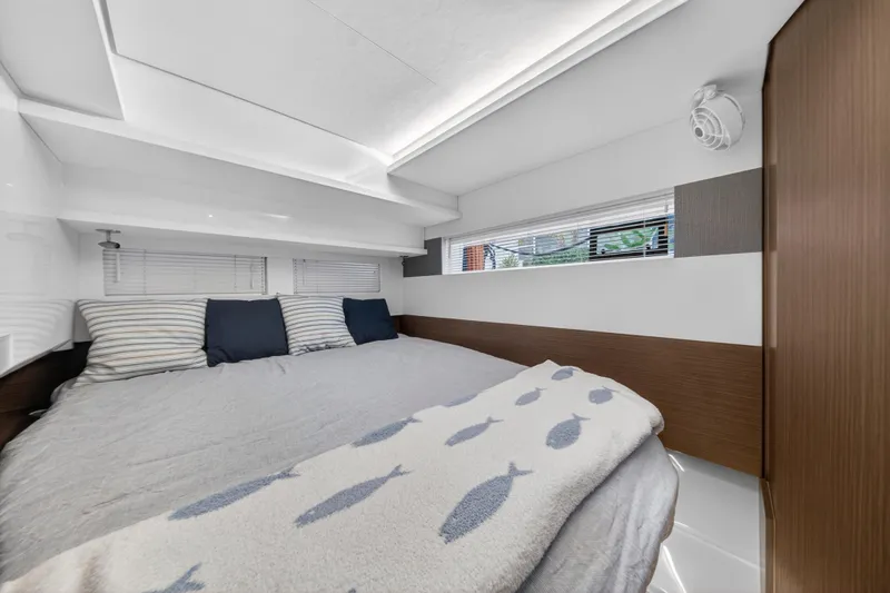  Yacht Photos Pics Luxurious bedroom interior of 2024 Leopard 46 Powercat yacht with modern design.