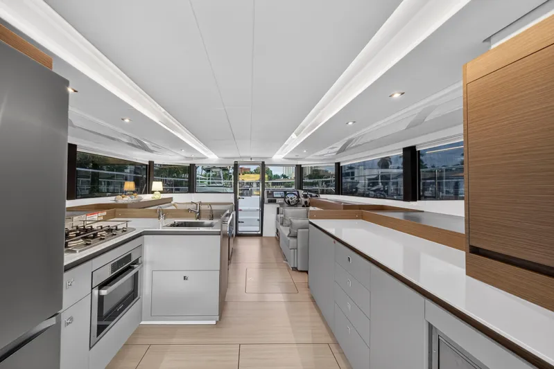  Yacht Photos Pics Luxurious interior of 2024 Leopard 46 Powercat yacht with modern kitchen and sleek design.