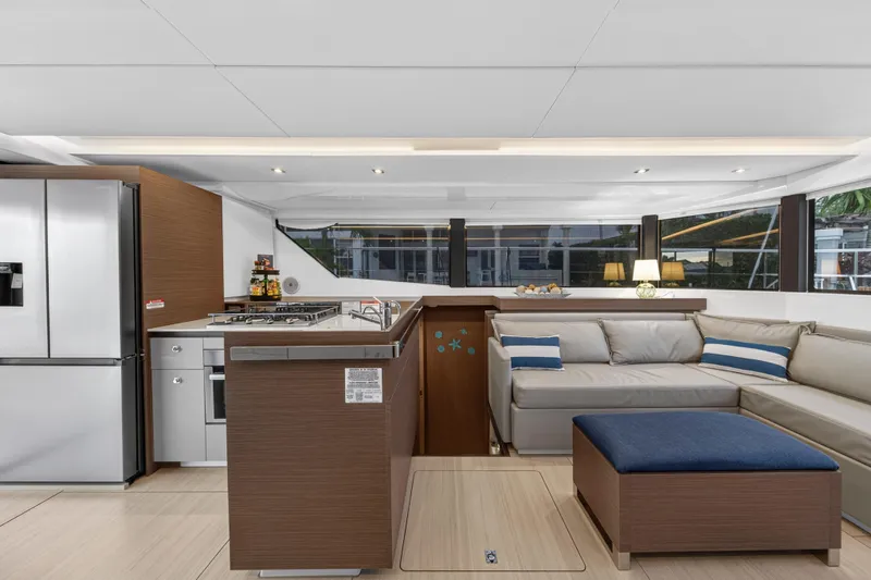  Yacht Photos Pics Luxurious interior of 2024 Leopard 46 Powercat with modern kitchen and comfortable seating area.