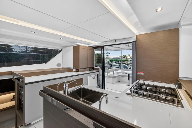  Yacht Photos Pics Modern kitchen interior of 2024 Leopard 46 Powercat yacht, featuring sleek design and appliances.