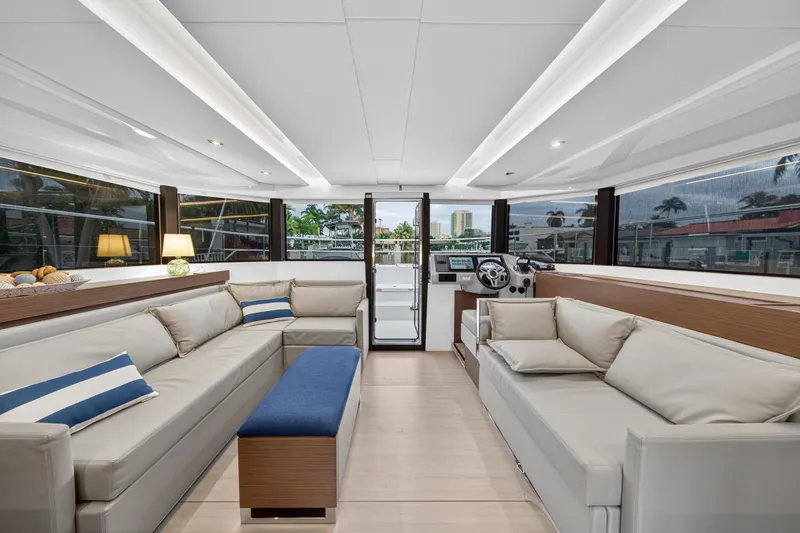  Yacht Photos Pics Luxurious interior of 2024 Leopard 46 Powercat yacht with modern seating and panoramic windows.