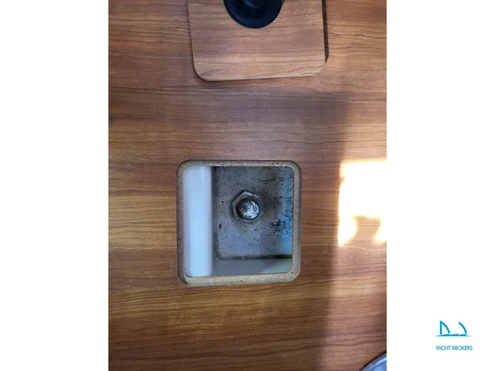  Yacht Photos Pics Wooden deck detail of a 2008 Hanse 400 sailboat, featuring a metal fitting.