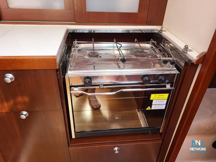  Yacht Photos Pics Built-in stove and oven in 2008 Hanse 400 yacht kitchen.