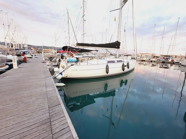  Yacht Photos Pics Sailboat Hanse 400, 2008 model, docked at marina with calm water reflections.
