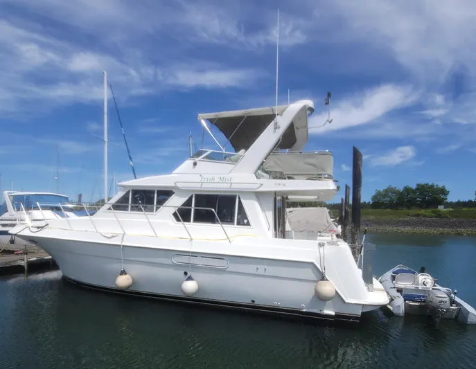 Irish Mist 11 Yacht Photos Pics 2003 Navigator 3900 Californian yacht docked under a clear blue sky.