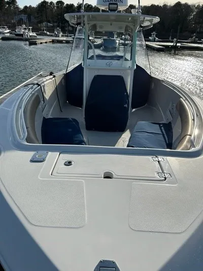  Yacht Photos Pics 2018 Sailfish 320 CC boat in harbor, front view.