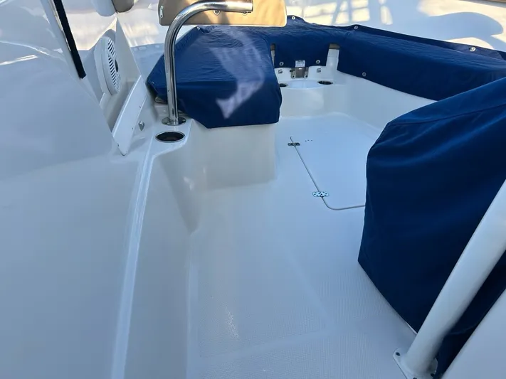  Yacht Photos Pics Interior of a 2018 Sailfish 320 CC boat with blue covers.