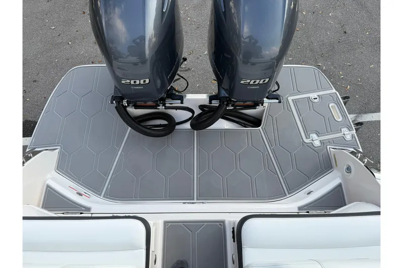  Yacht Photos Pics 2019 Regal 29 OBX boat with twin Yamaha 200 engines on gray deck.