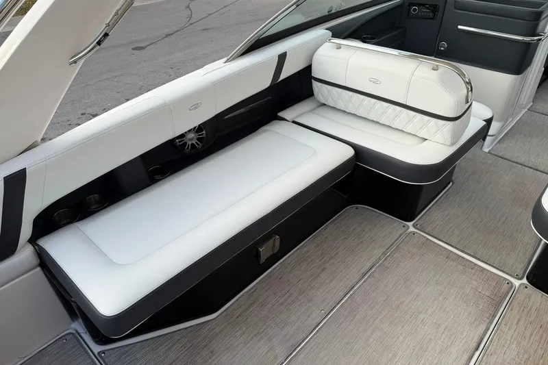  Yacht Photos Pics 2019 Regal 29 OBX boat interior with sleek white seating and modern design.