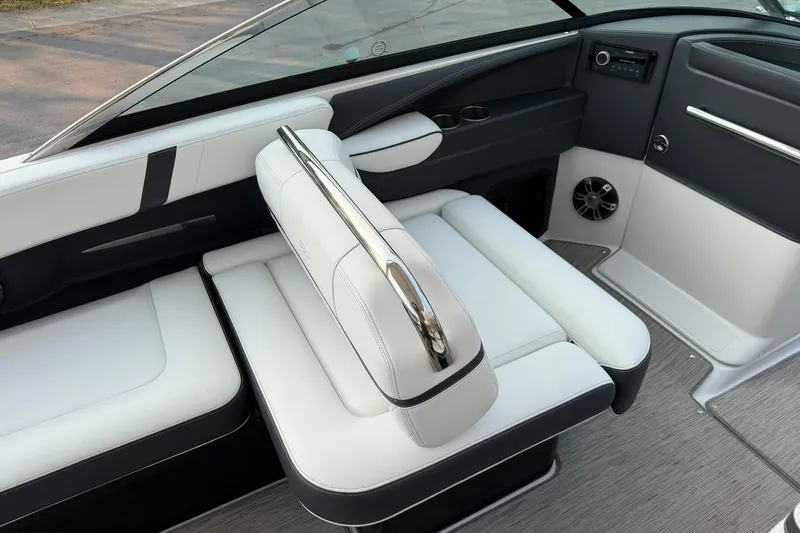  Yacht Photos Pics 2019 Regal 29 OBX boat interior with white seating and modern dashboard.