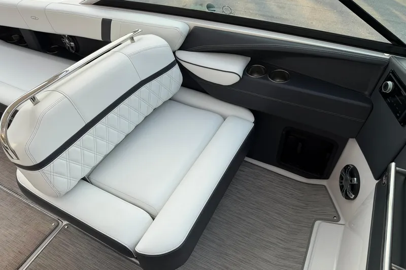  Yacht Photos Pics 2019 Regal 29 OBX boat interior with white leather seating and modern design.