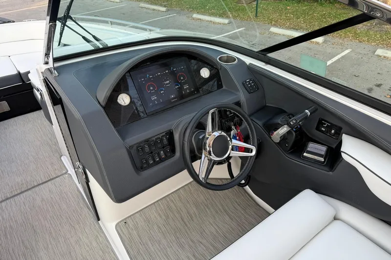 Yacht Photos Pics 2019 Regal 29 OBX boat dashboard with modern controls and steering wheel.
