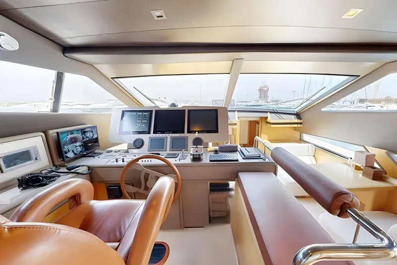 M/y Ilav Yacht Photos Pics Luxurious helm of 2011 Ferretti Yachts 800 with modern navigation equipment and leather seating.