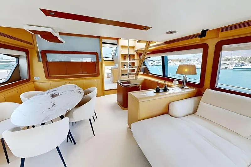 M/y Ilav Yacht Photos Pics Luxurious interior of 2011 Ferretti Yachts 800 with elegant dining and seating area.