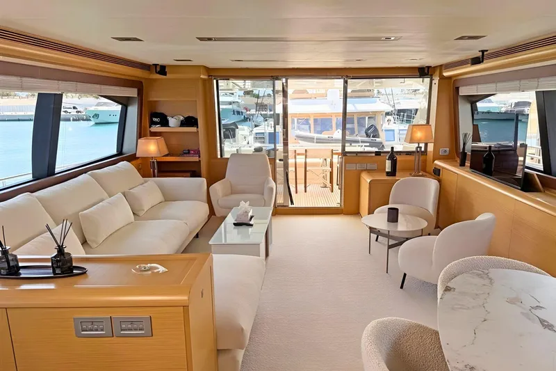 M/y Ilav Yacht Photos Pics Luxurious interior of a 2011 Ferretti Yachts 800, featuring elegant seating and large windows.