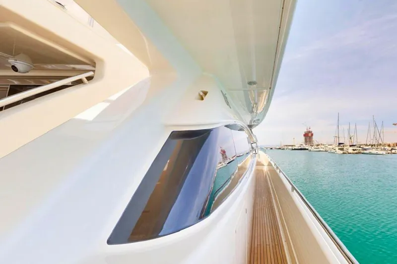 M/y Ilav Yacht Photos Pics Side view of 2011 Ferretti Yachts 800, docked in a marina with clear skies.