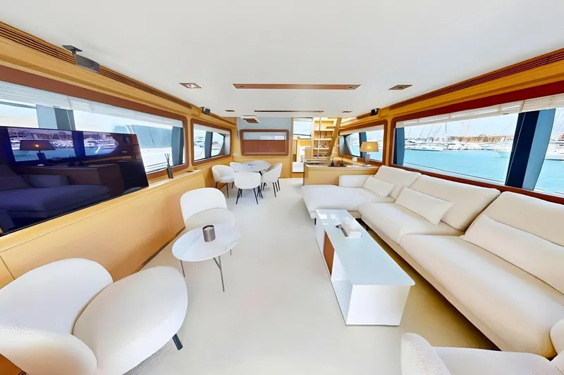 M/y Ilav Yacht Photos Pics Luxurious interior of 2011 Ferretti Yachts 800 with elegant seating and panoramic windows.