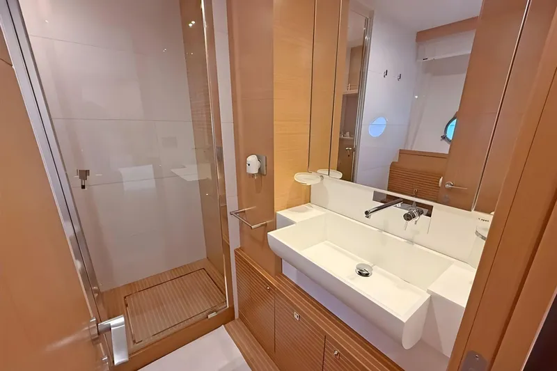 M/y Ilav Yacht Photos Pics Luxurious bathroom in 2011 Ferretti Yachts 800, featuring modern sink and shower.