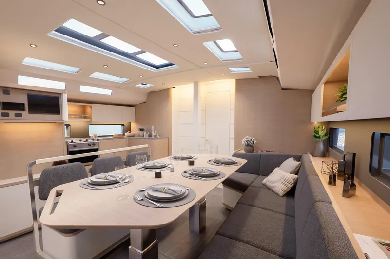  Yacht Photos Pics Luxurious interior of 2025 Dufour 48 yacht with modern dining and kitchen area.