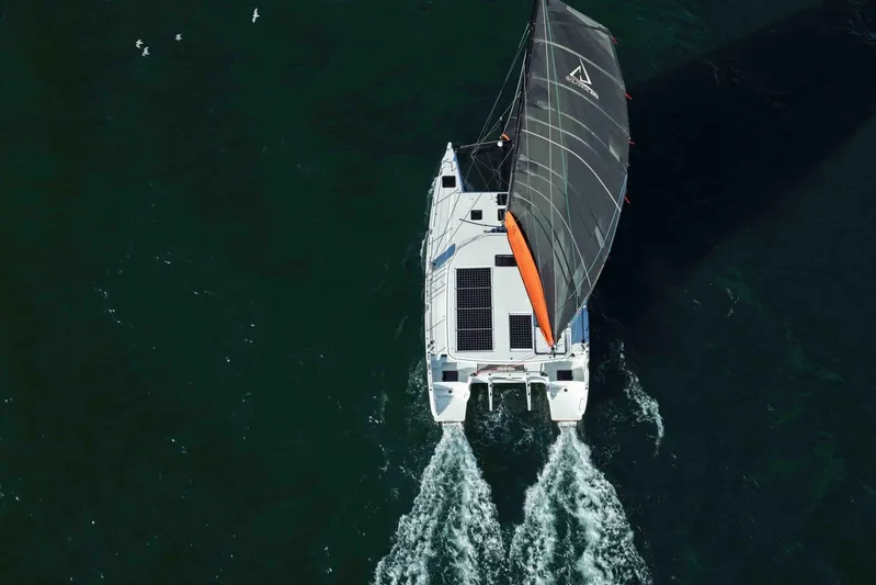  Yacht Photos Pics Aerial view of Balance 502 catamaran sailing on open water, 2027 model.