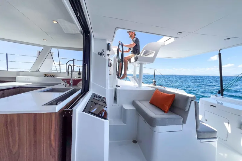  Yacht Photos Pics Modern Balance 502 yacht interior with helm, seating, and ocean view, 2027 model.