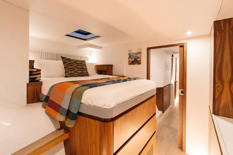  Yacht Photos Pics Luxurious bedroom interior in Balance 502 yacht, 2027 model, featuring modern design and cozy decor.